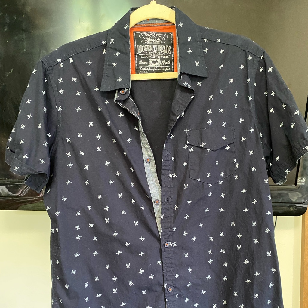 Broken Threads Means Large Button Down